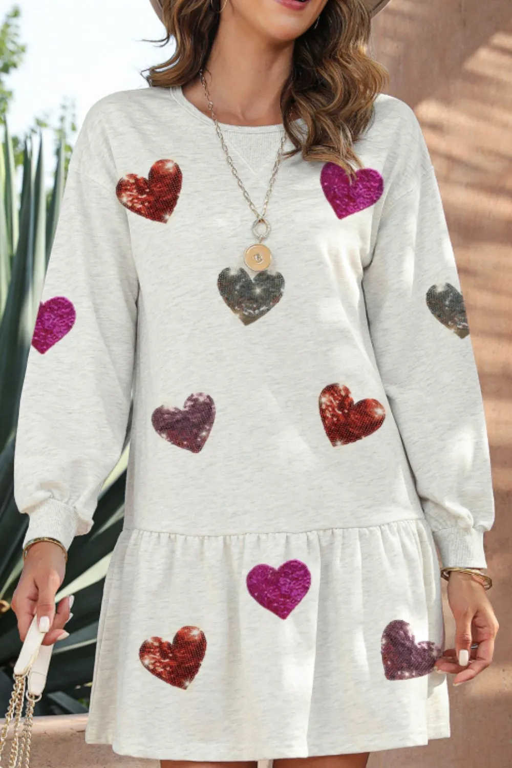 Sequin Heart Round Neck Long Sleeve Mini Dress sold by Charming Charlie