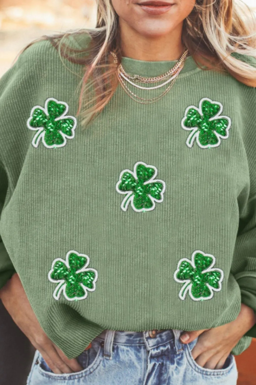 Sequin Lucky Clover Round Neck Long Sleeve Sweatshirt sold by Charming Charlie