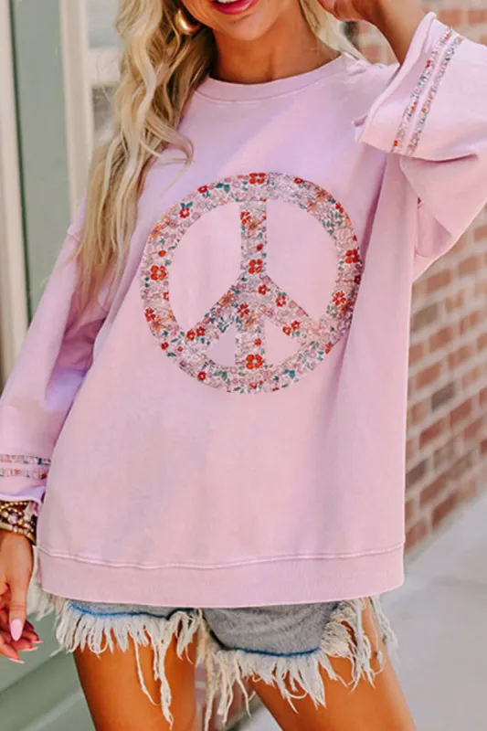 Peace Patch Round Neck Long Sleeve Top sold by Charming Charlie
