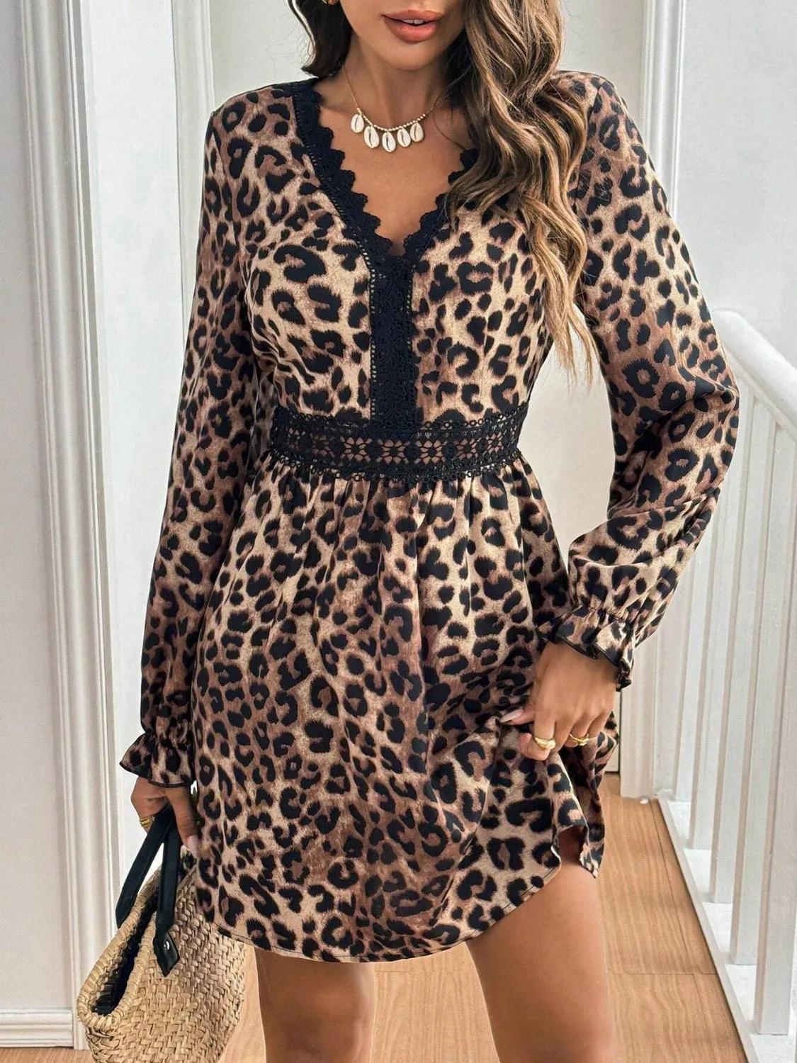 Lace Detail Leopard Flounce Sleeve Mini Dress sold by Charming Charlie product image thumbnail 4
