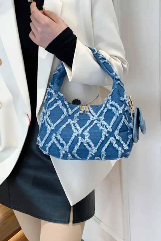Raw Edge Denim Handbag with Pouch sold by Charming Charlie