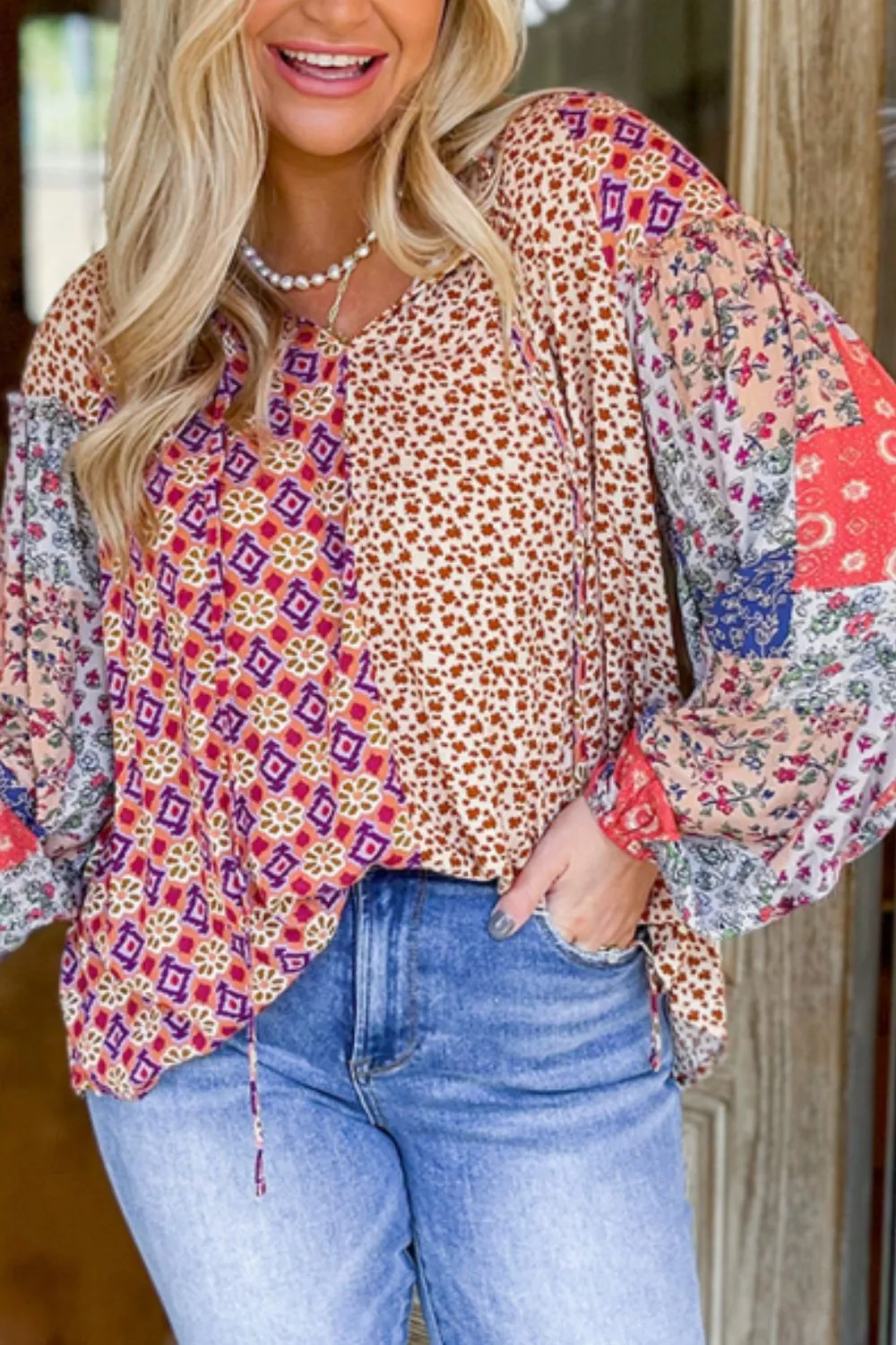 Printed Tie Neck Long Sleeve Blouse sold by Charming Charlie