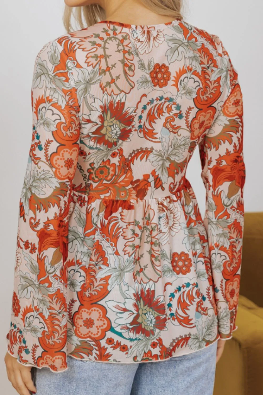 Floral V-Neck Flare Sleeve Blouse sold by Charming Charlie product image thumbnail 4