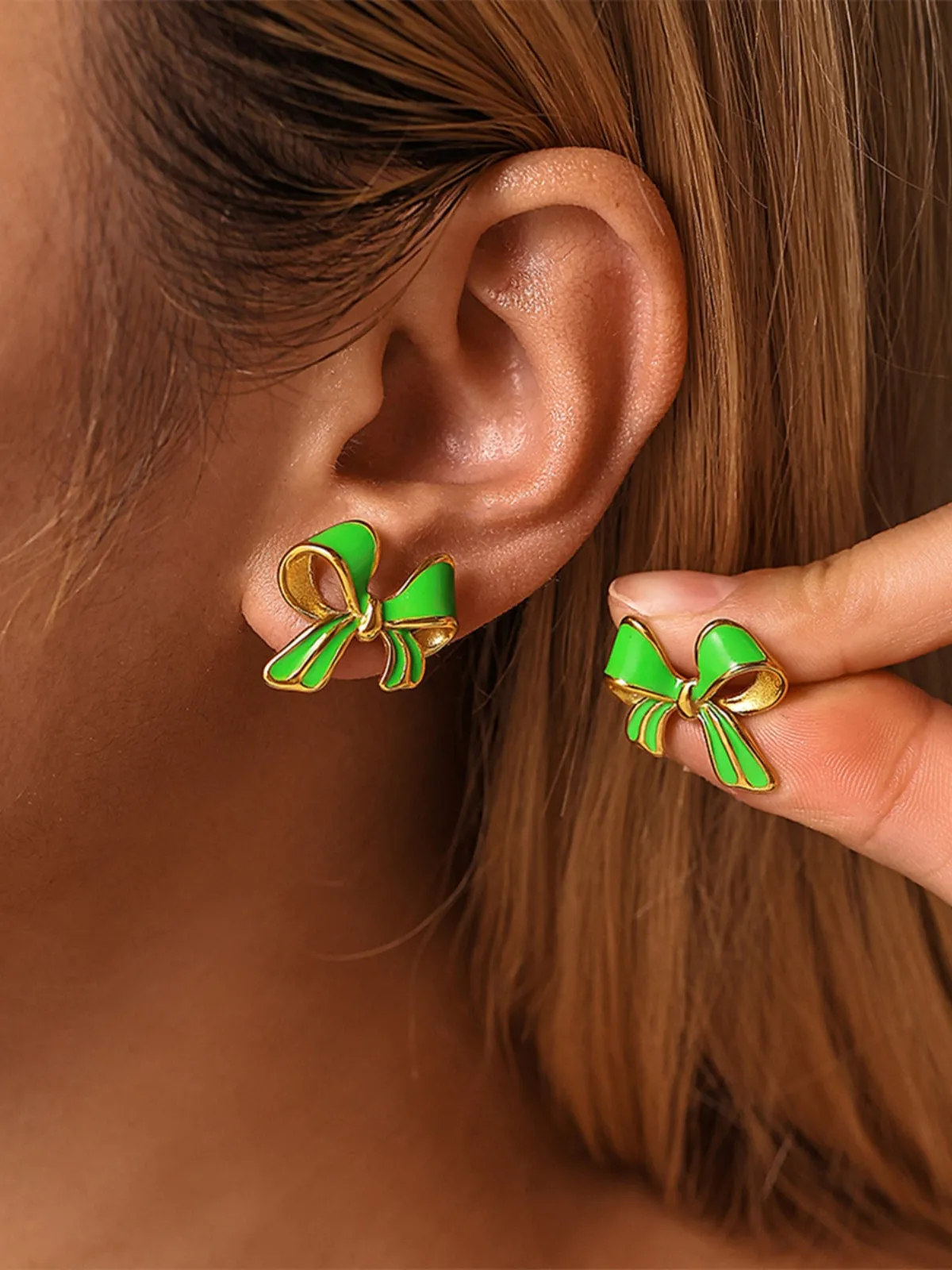 Stainless Steel Oil Drip Bow Stud Earrings sold by Charming Charlie product image thumbnail 3