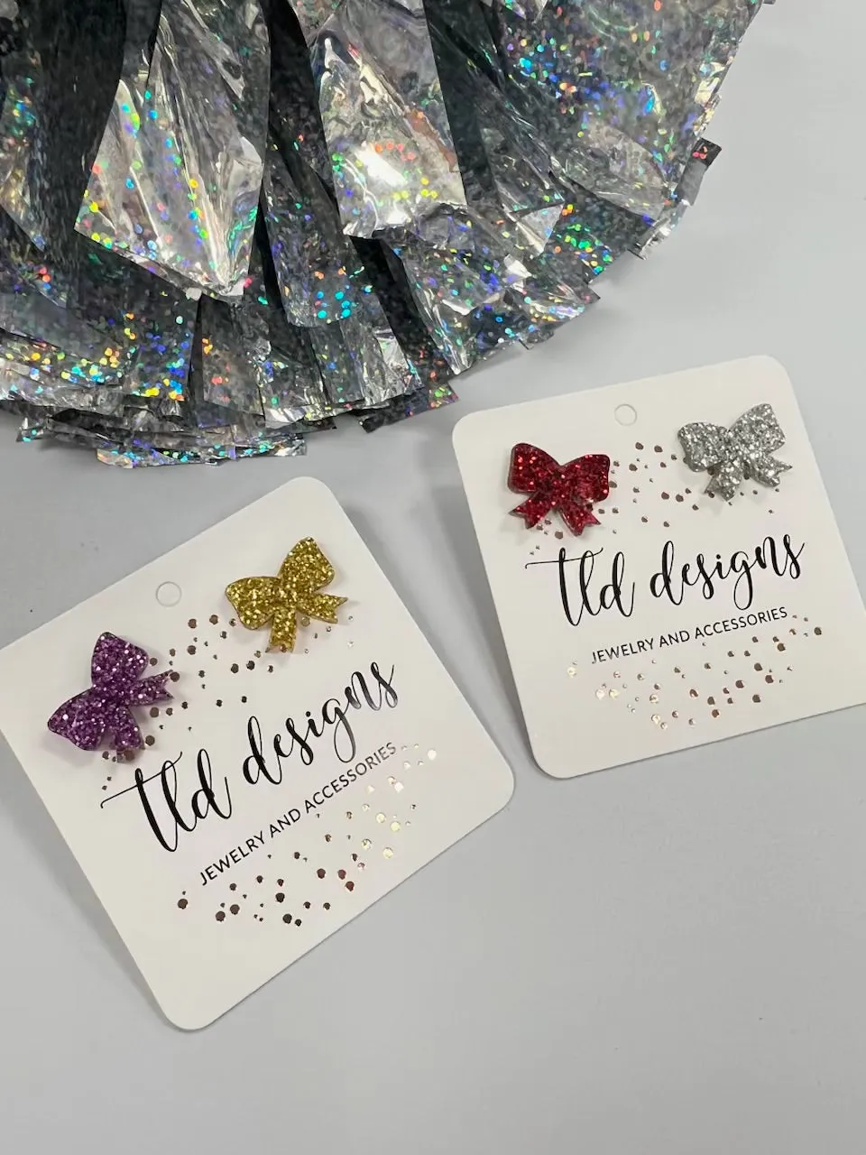 Game Day Bow Studs sold by Charming Charlie product image thumbnail 4