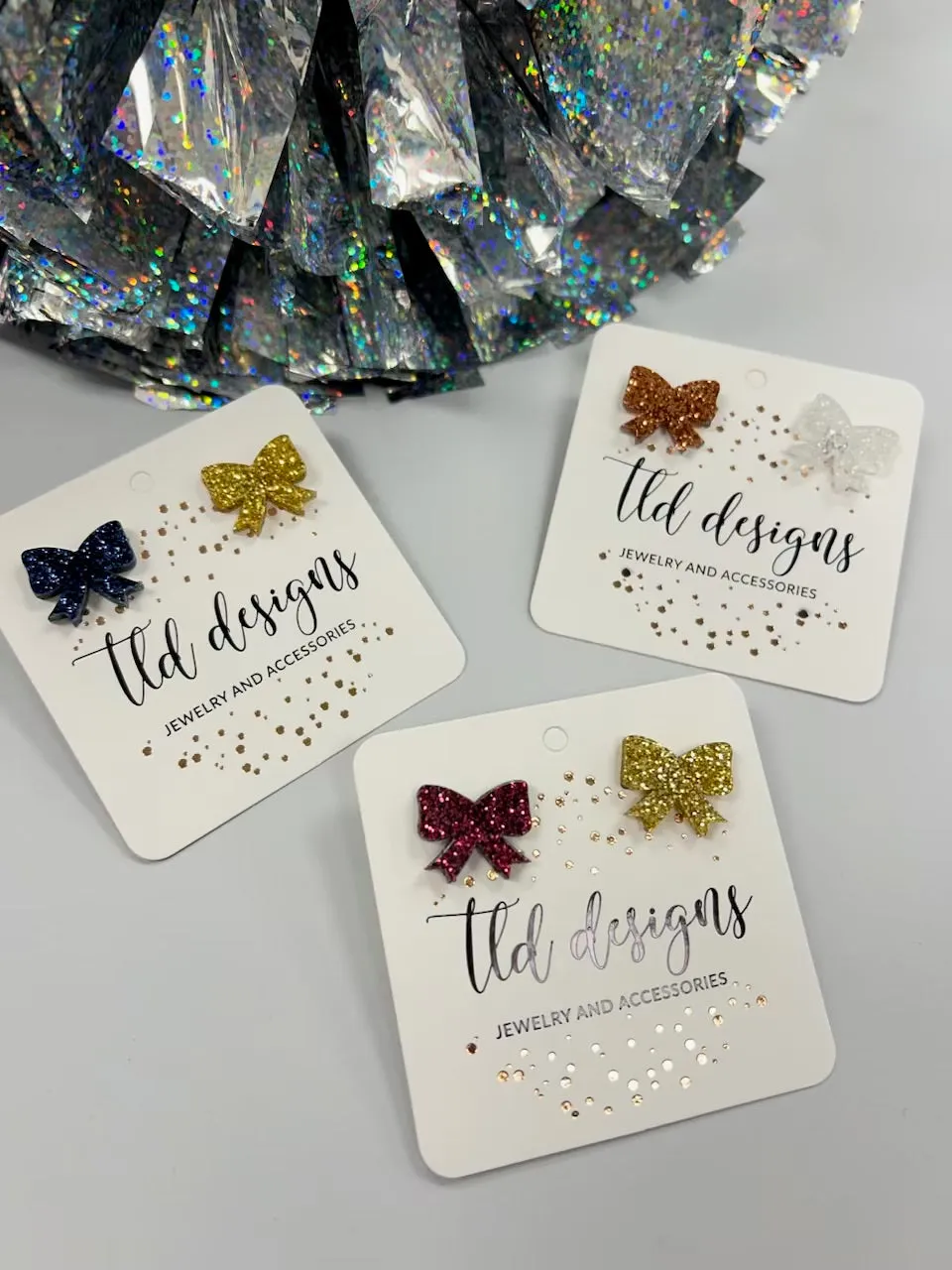 Game Day Bow Studs sold by Charming Charlie product image thumbnail 5