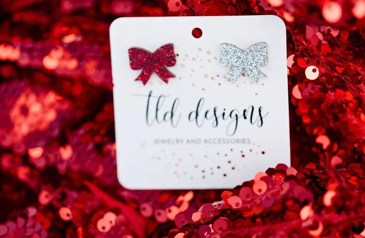 Game Day Bow Studs sold by Charming Charlie