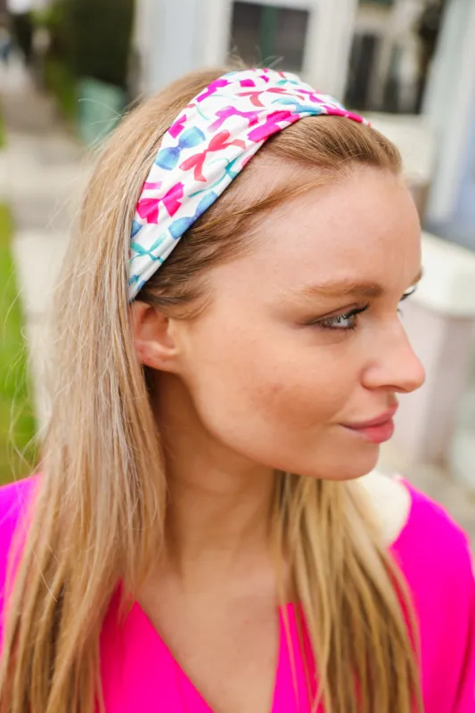 Red & Blue Valentine Bow Print Twist Headband sold by Charming Charlie