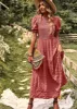 Smocked textured midi dress sold by Charming Charlie