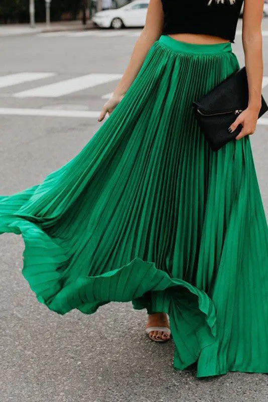 Pleated maxi skirt sold by Charming Charlie