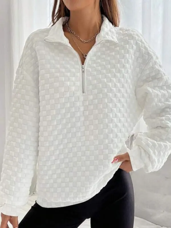 Textured half zip sweatshirt sold by Charming Charlie