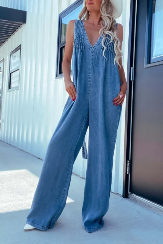 V-Neck Wide Leg Denim Jumpsuit sold by Charming Charlie