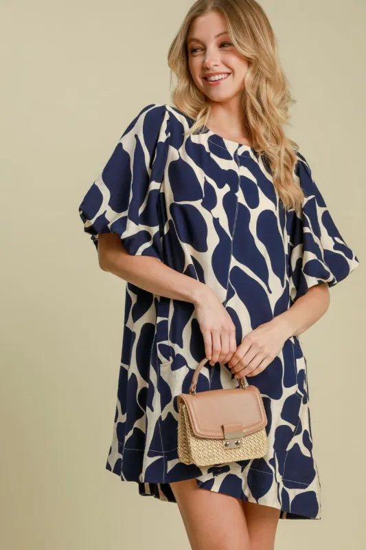 Umgee Two Tone Abstract Print Puff Sleeve Dress sold by Charming Charlie