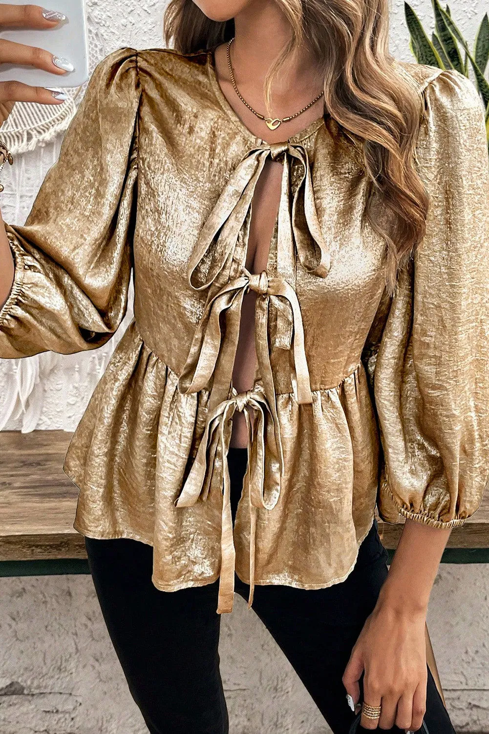 Tied Peplum Three-Quarter Sleeve Blouse sold by Charming Charlie