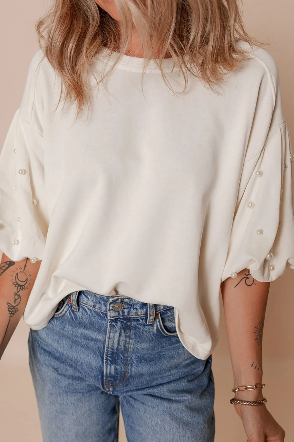 Pearl Detail Round Neck Half Sleeve Blouse sold by Charming Charlie product image thumbnail 2