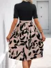 Perfee Tied Printed Mock Neck Short Sleeve Dress sold by Charming Charlie