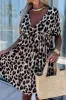 Cutout Back Leopard V-Neck Short Sleeve Mini Dress sold by Charming Charlie