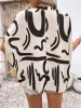 Perfee Printed Notched Half Sleeve Blouse sold by Charming Charlie