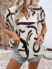 Perfee Printed Notched Half Sleeve Blouse sold by Charming Charlie