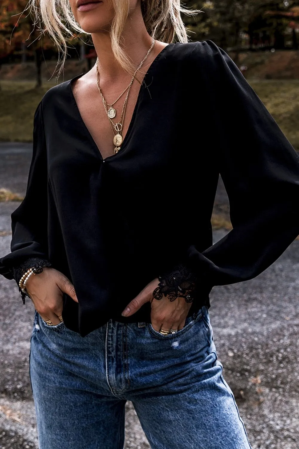 Lace Detail Surplice Long Sleeve Blouse sold by Charming Charlie