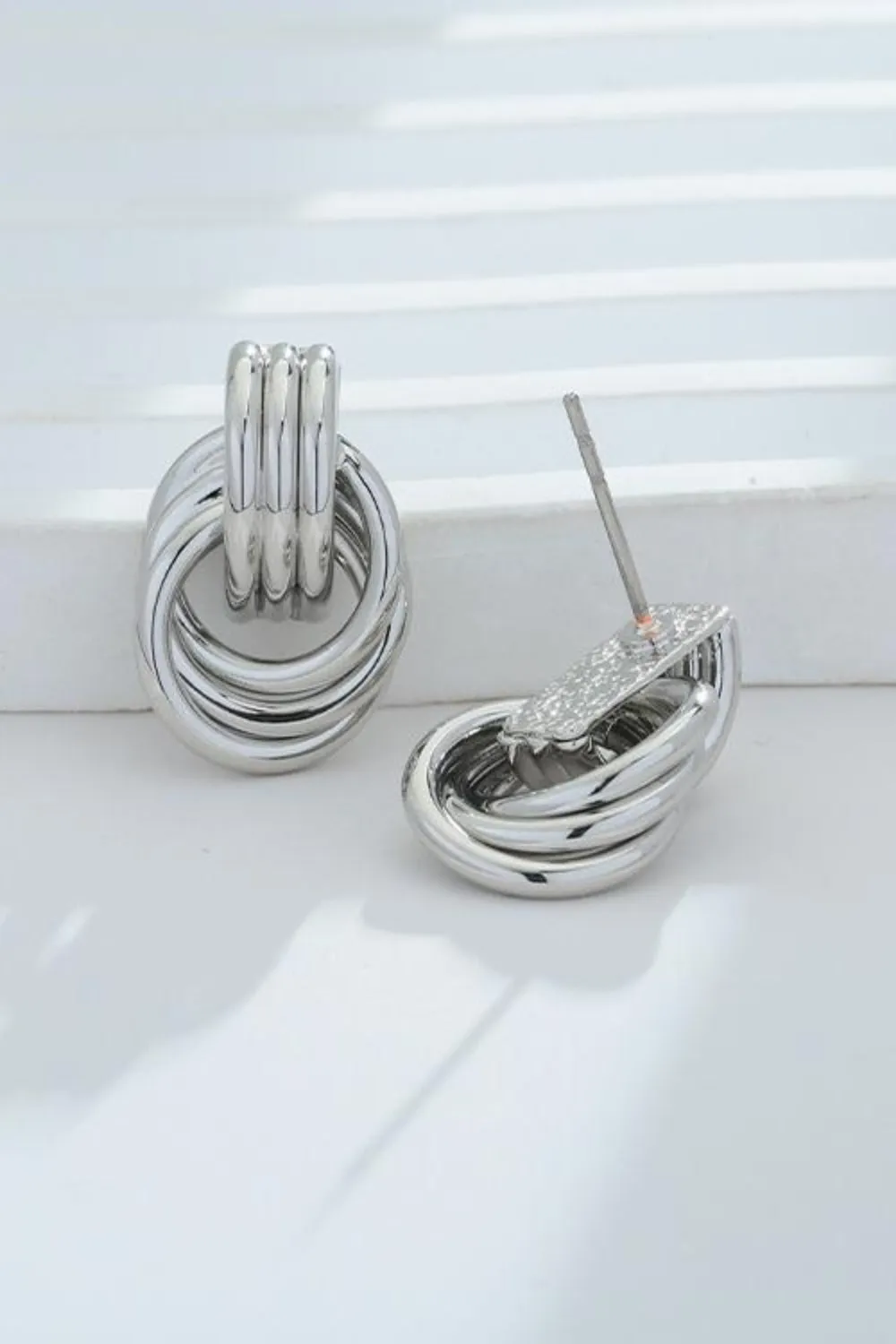 Gold-Plated Knotted Stud Earrings sold by Charming Charlie product image thumbnail 4