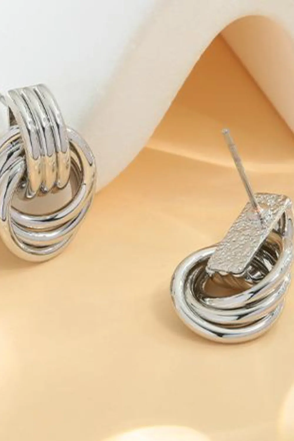 Gold-Plated Knotted Stud Earrings sold by Charming Charlie product image thumbnail 3