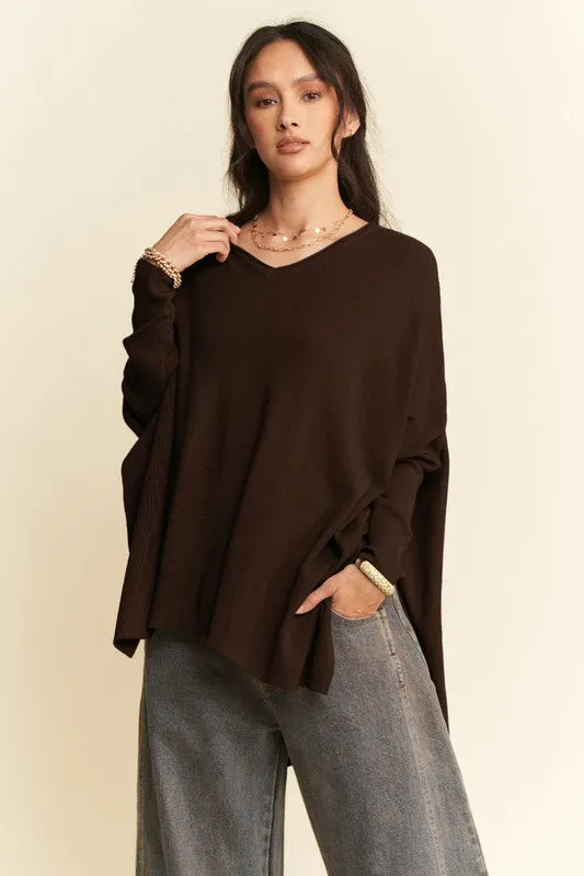 Davi & Dani High-Low Side Slit Batwing Sleeve Top sold by Charming Charlie