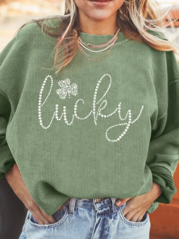 LUCKY Rhinestone Round Neck Long Sleeve Sweatshirt sold by Charming Charlie