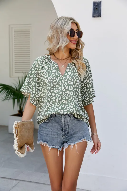 Leopard Notched Half Sleeve Blouse sold by Charming Charlie
