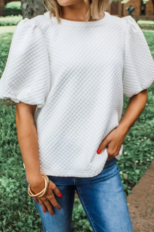 Textured Round Neck Puff Sleeve Blouse sold by Charming Charlie