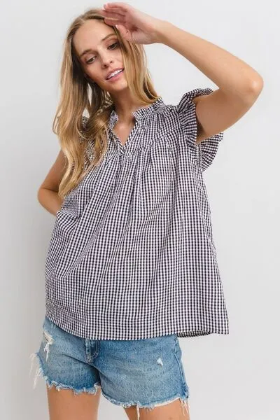 Ces Femme Plaid Notched Ruffled Cap Sleeve Blouse sold by Charming Charlie product image thumbnail 3