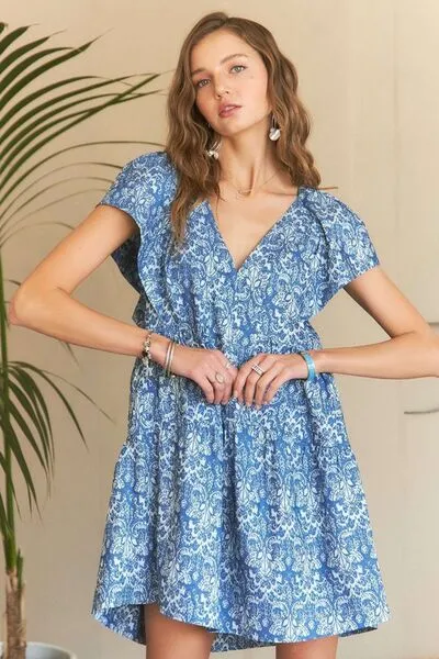 ADORA Printed V-Neck Ruffle Sleeve Mini Dress sold by Charming Charlie