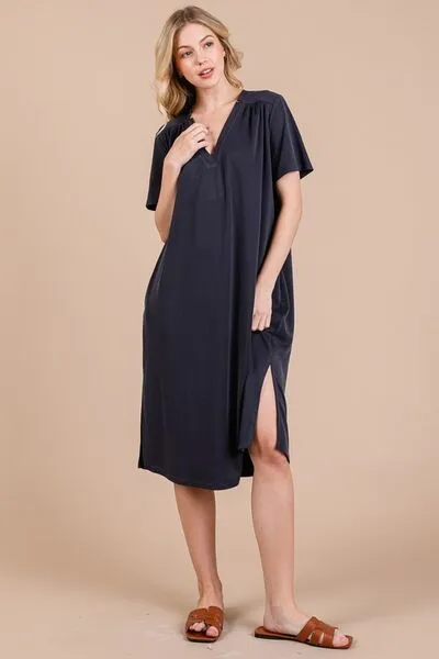Ces Femme Side Slit Short Sleeve Midi Dress with Pockets sold by Charming Charlie