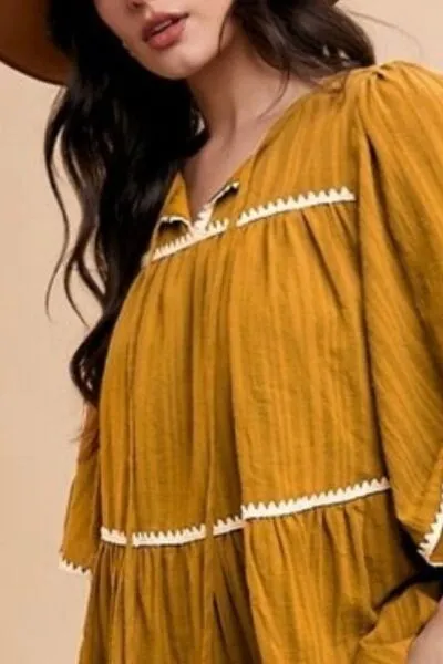 Annie Wear Tassel Contrast Trim Tie Neck Half Sleeve Tiered Dress sold by Charming Charlie product image thumbnail 2