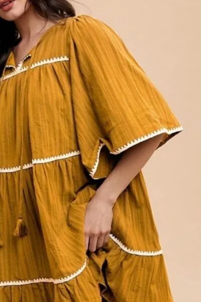Annie Wear Tassel Contrast Trim Tie Neck Half Sleeve Tiered Dress sold by Charming Charlie product image thumbnail 3