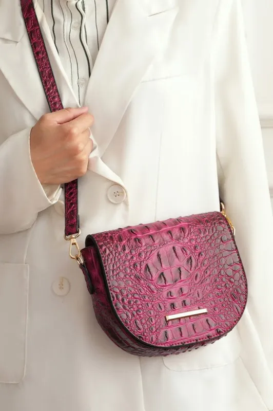 MKF Amalia Solid Croc-Embossed Crossbody Bag sold by Charming Charlie
