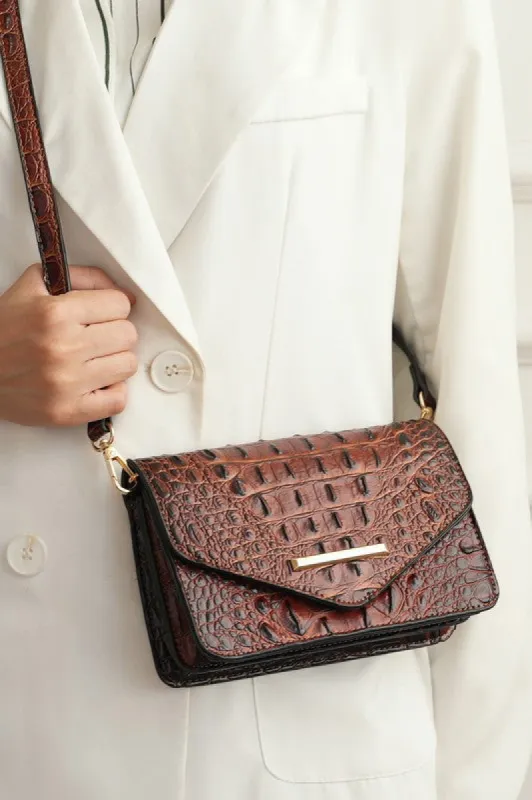 MKF Vanta Solid Croc-Embossed Saddle Bag by Mia K sold by Charming Charlie