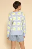 Tiled lemon knit cardigan sold by Charming Charlie