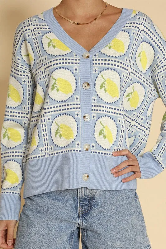 Tiled lemon knit cardigan sold by Charming Charlie