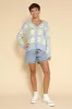 Tiled lemon knit cardigan sold by Charming Charlie