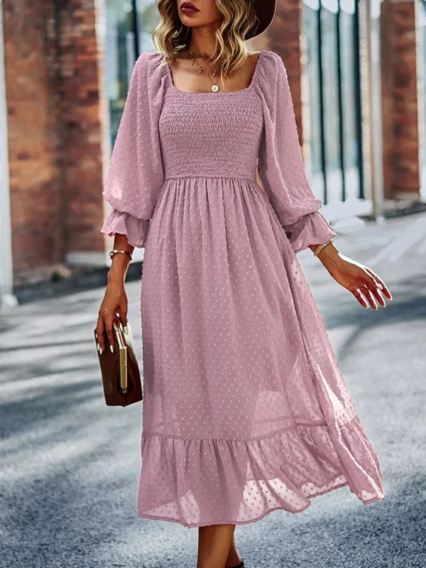 Smocked long sleeve dot dress sold by Charming Charlie