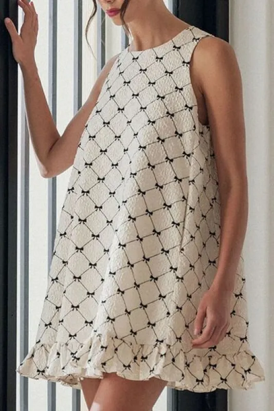 Ruffled Hem Bow Print Sleeveless Mini Dress sold by Charming Charlie