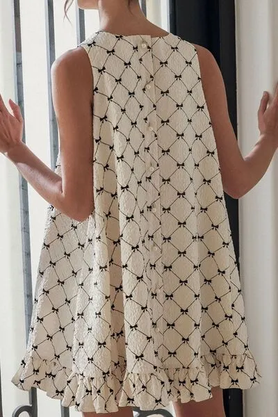 Ruffled Hem Bow Print Sleeveless Mini Dress sold by Charming Charlie product image thumbnail 3