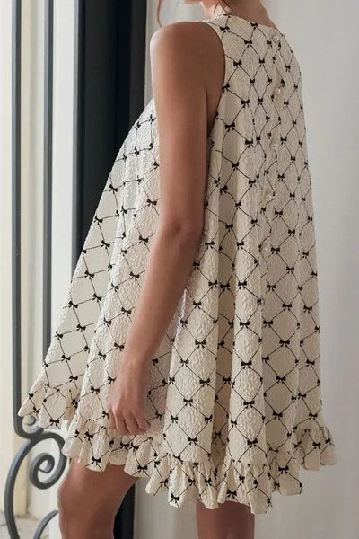 Ruffled Hem Bow Print Sleeveless Mini Dress sold by Charming Charlie product image thumbnail 2