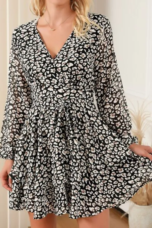 Printed Surplice Long Sleeve Mini Dress sold by Charming Charlie