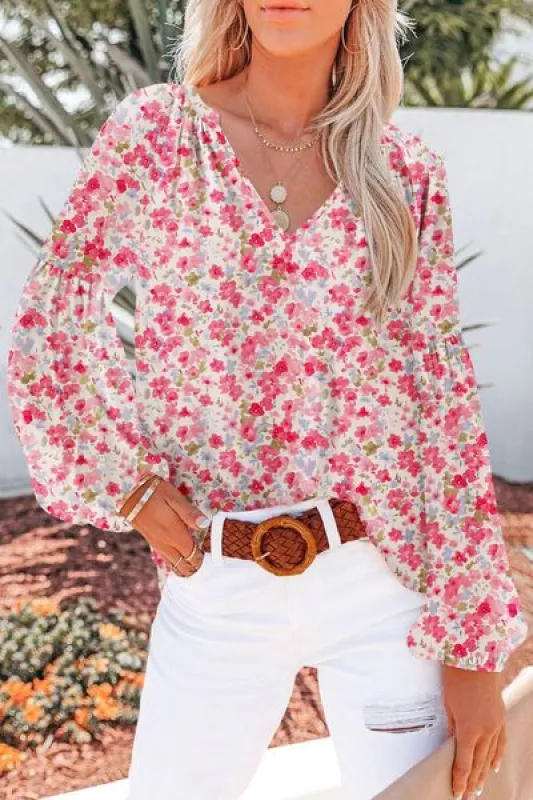 Printed Notched Long Sleeve Blouse sold by Charming Charlie