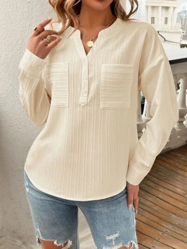 Devine Pocketed Notched Long Sleeve Blouse sold by Charming Charlie