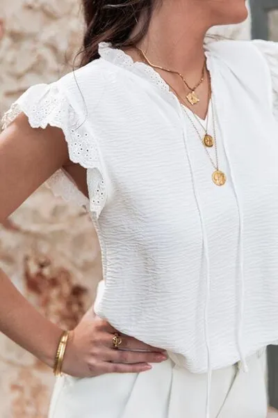 Ruffled Tie Neck Cap Sleeve Blouse sold by Charming Charlie product image thumbnail 3