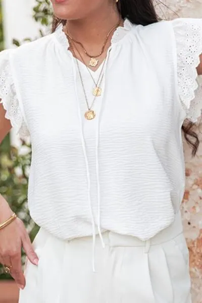 Ruffled Tie Neck Cap Sleeve Blouse sold by Charming Charlie product image thumbnail 2