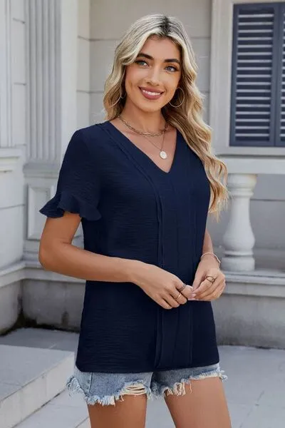 Ruffled V-Neck Short Sleeve Blouse sold by Charming Charlie